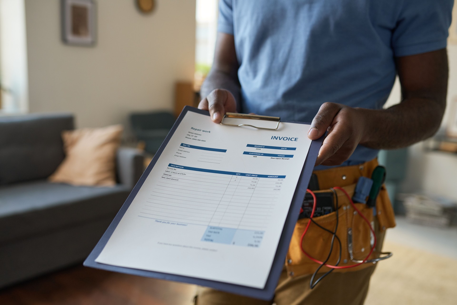 Home Maintenance Worker Holding Clipboard