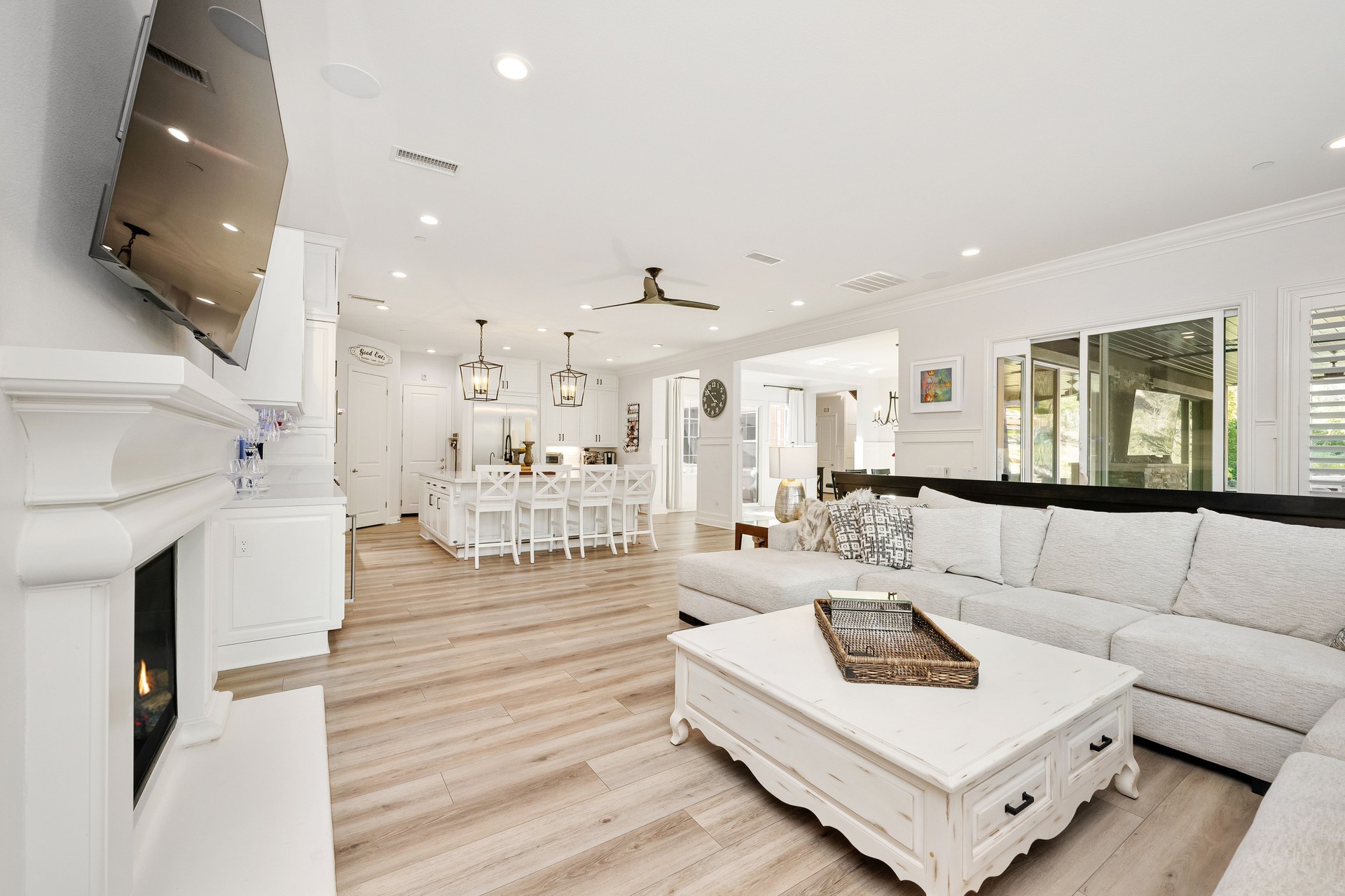 Elegant open-concept living space with a cozy sofa, and stylish furnishings in a luxury home